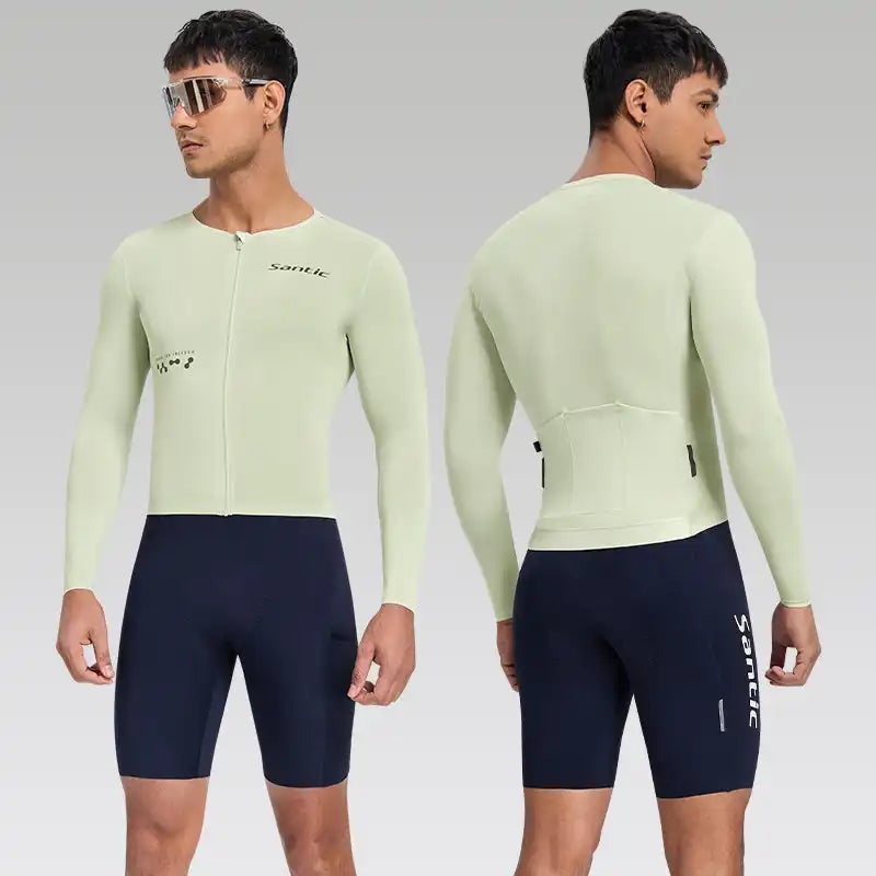 Mann i lysegrønn Santic langermet sykkeltrøye og mørkeblå sykkelshorts, vist fra front og rygg.