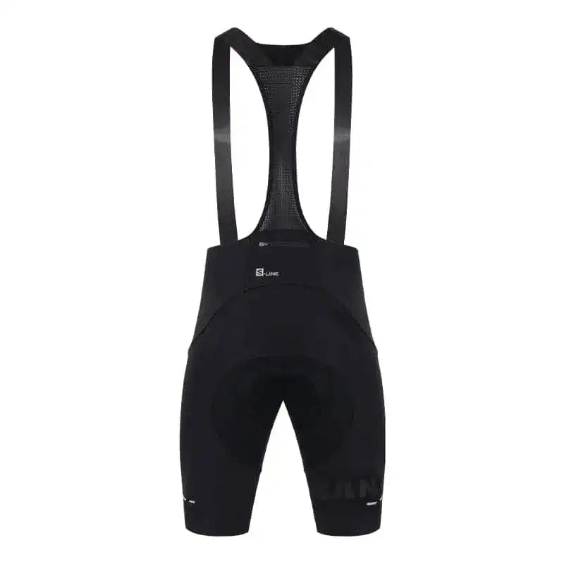 Svart S-Line sykkelshorts med seler sett bakfra, med pustende mesh-rygg og polstring for sykling.