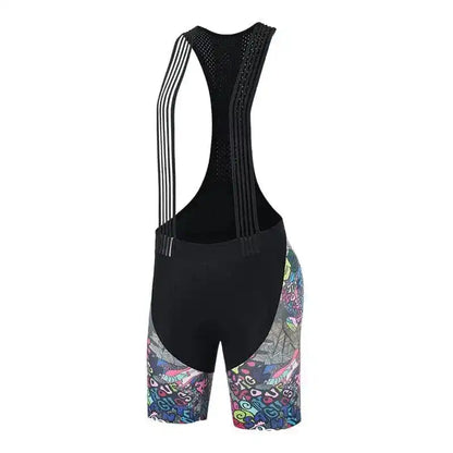 Svart bib-shorts for sykling med fargerikt grafisk mønster på bena og pustende seler.
